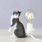 Cat mini night light: black-and-white cat figure holding a glowing light bulb