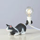 Cat figurine mini night light table lamp with glowing bulb, lying pose, dark gray and white