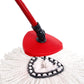 White cotton rotating triangle mop head cloth on red base with black trim
