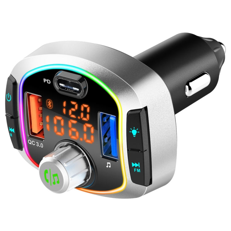Car audio receiver adapter with digital display, rotary knob, and RGB-lit side ports.