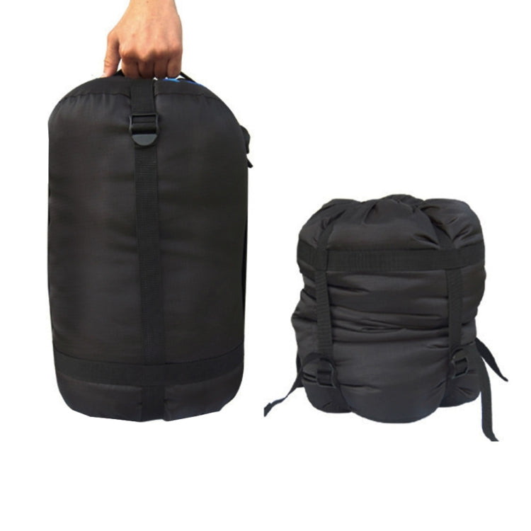Black waterproof sleeping bag storage bag with top handle and compression straps