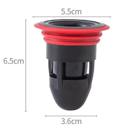 Black floor drain core with red top ring and circular opening
