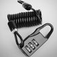 Black coiled cable helmet lock with four-digit combination keypad and metal locking hook
