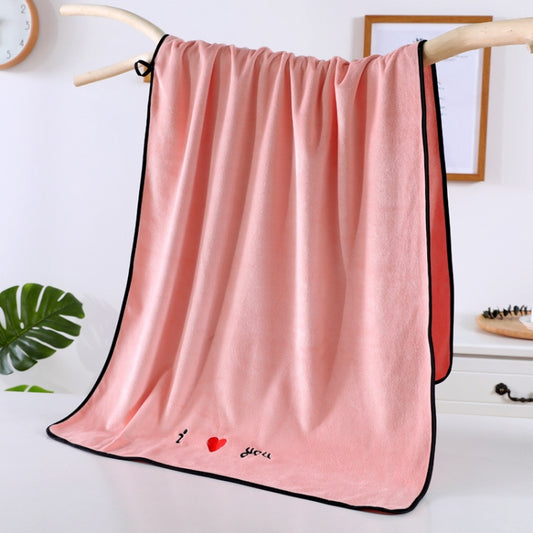 Pink large bath towel with black edge trim and heart “you” embroidery