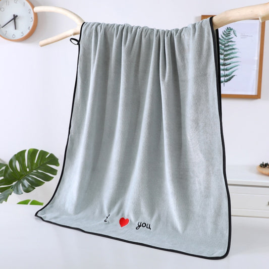 Grey large bath towel with black edge trim and heart “you” embroidery