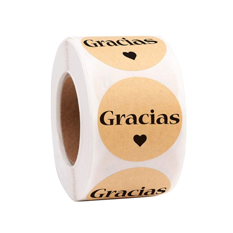 Round Gracias label stickers on a roll, kraft beige background with heart icons