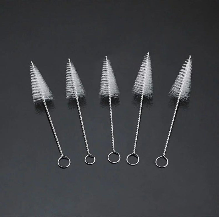 Set of nozzle cleaning brushes with silver wire and white nylon bristles, loop handles