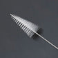 Long nozzle cleaning brush with dense white bristles on a twisted silver wire