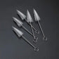 Nozzle cleaning brush set showing multiple brushes with white bristle tips and ring loops