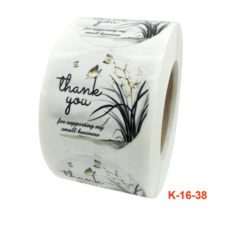 White roll of round thank-you sealing stickers featuring a floral branch and butterflies