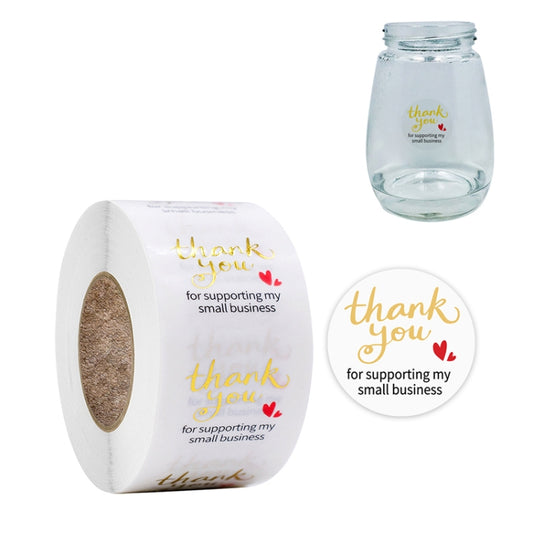 Transparent thank-you sealing stickers with gold script on roll and single round label