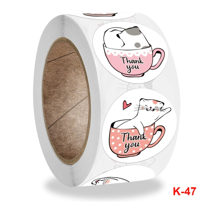 Round cat thank-you cup stickers on roll, close-up, K-47 label