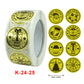 Roll of Christmas sticker labels plus loose gold circular “Merry Christmas” stickers, K-24-25