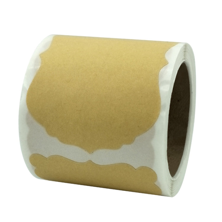 Roll of beige kraft paper gift label stickers with scalloped label shapes