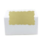 Beige scalloped label sticker on a white gift box front