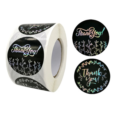 Round black 'Thank you' sticker roll with colorful floral ring design, silver backing