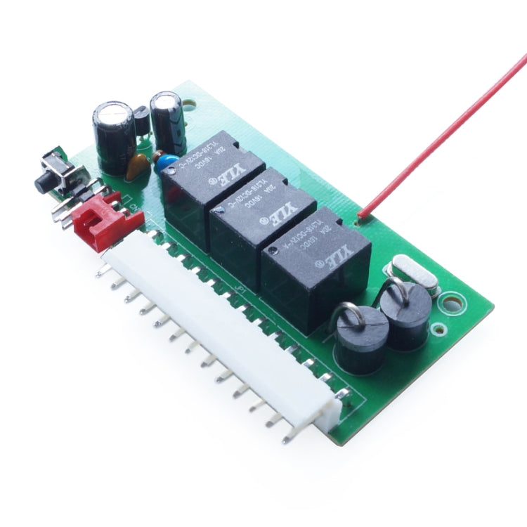 Central lock PCB with relay chips, capacitors, and wiring connector leads
