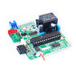 Car alarm circuit board module with components and blue/green headers