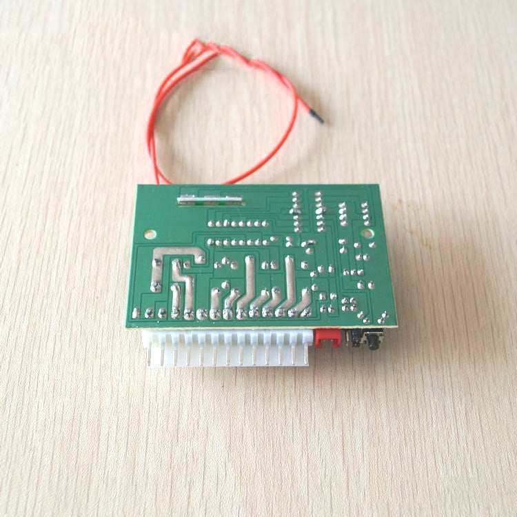 Central lock control PCB with circuit details and red wire lead