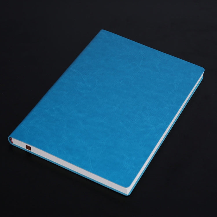Blue PU notebook with plain cover and white page edges.