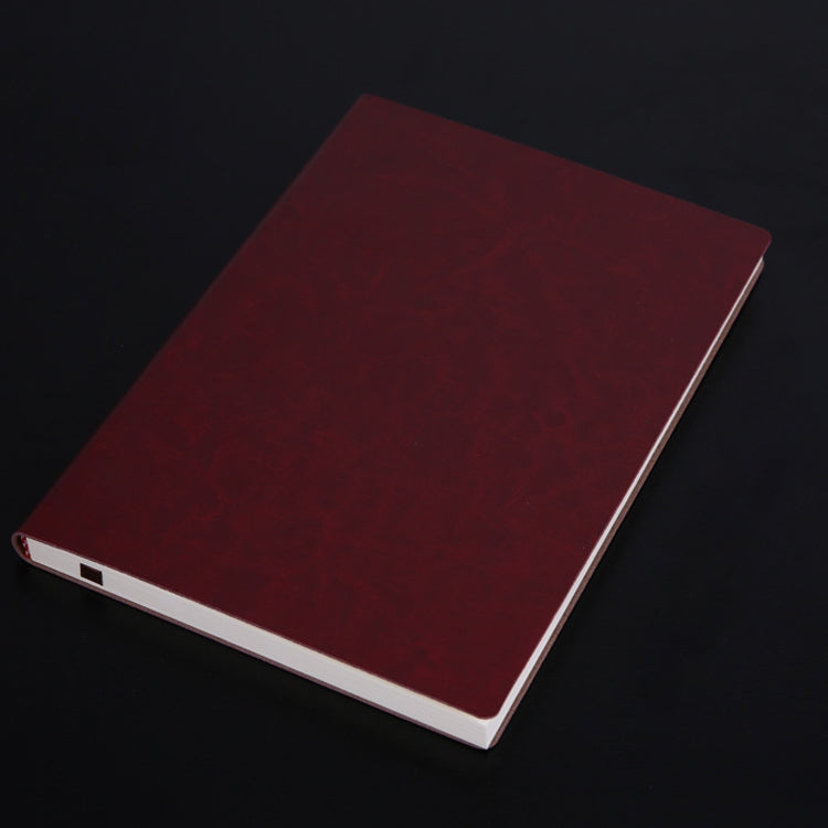 Deep red PU notebook with plain cover and white page edges.