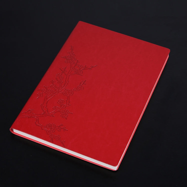 Red PU notebook with embossed floral tree design and white page edges.