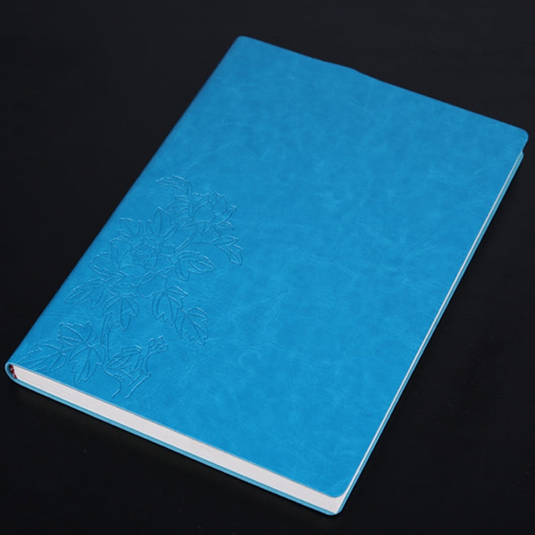 Blue PU notebook with embossed floral design on textured cover, white page edges