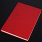 Red PU notebook with embossed tree-like floral design, white page edges