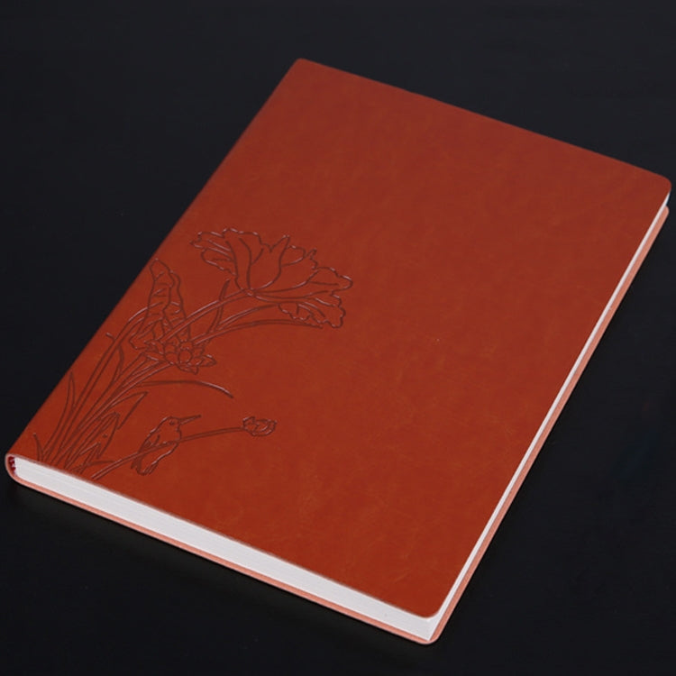 Orange PU notebook with embossed floral branch design, white page edges