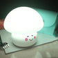 Cute white silicone mushroom night light with blush cheeks and gentle smile