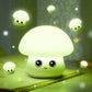 Green glowing silicone mushroom night light with happy face
