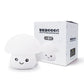White silicone mushroom night light with cute face and retail box packaging