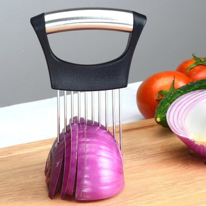 Onion slicing aid with black handle and stainless steel pins holding a purple onion