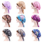 Satin turban hats with ribbon bows in multiple colors and prints