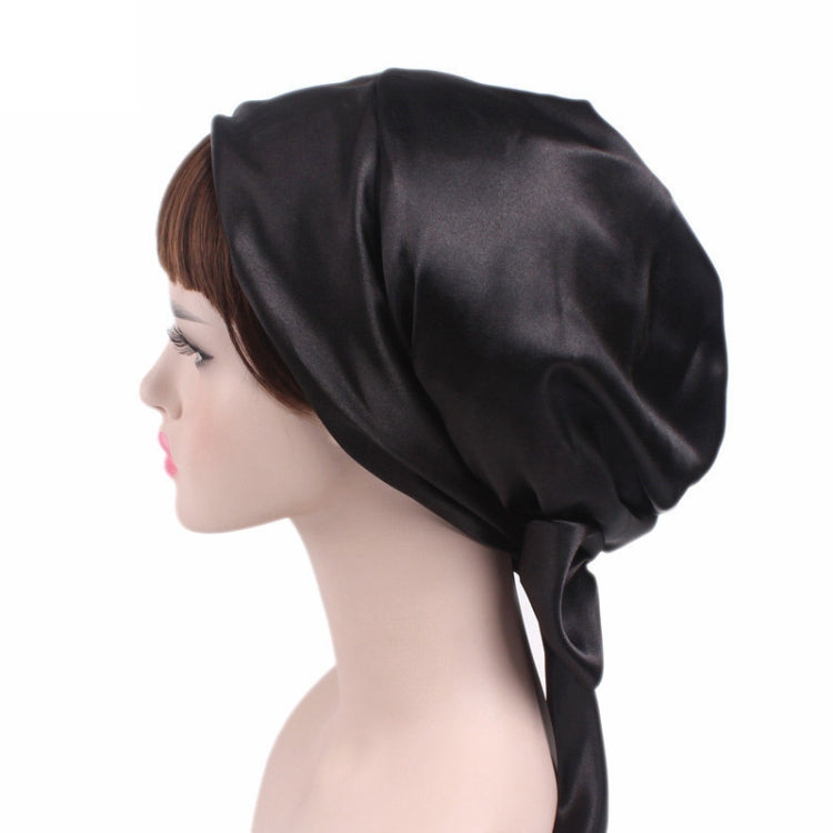 Black satin turban hat with gathered crown and long tie at back