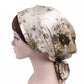 Beige floral satin turban hat with bird print and side tie knot
