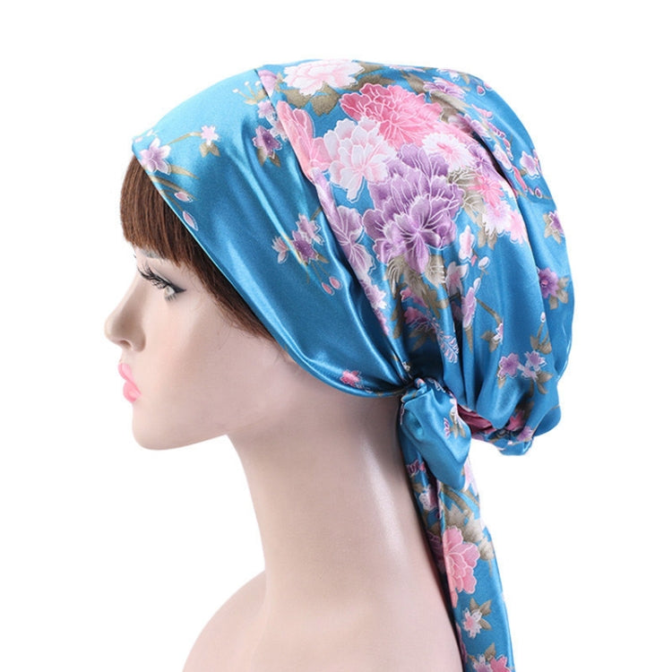 Satin print ribbon bow turban hat in blue with pink floral print, side tie
