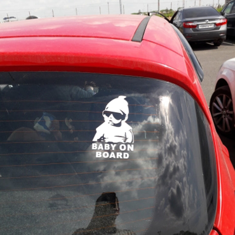 Reflective “BABY ON BOARD” baby-sunglasses decal on red car rear window