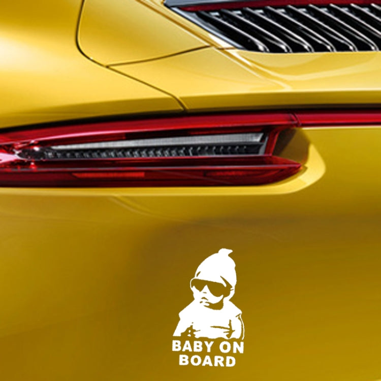 Reflective “BABY ON BOARD” baby-sunglasses sticker on yellow car rear panel