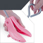 Pink adjustable boot support with prongs and heart-shaped hanging hook