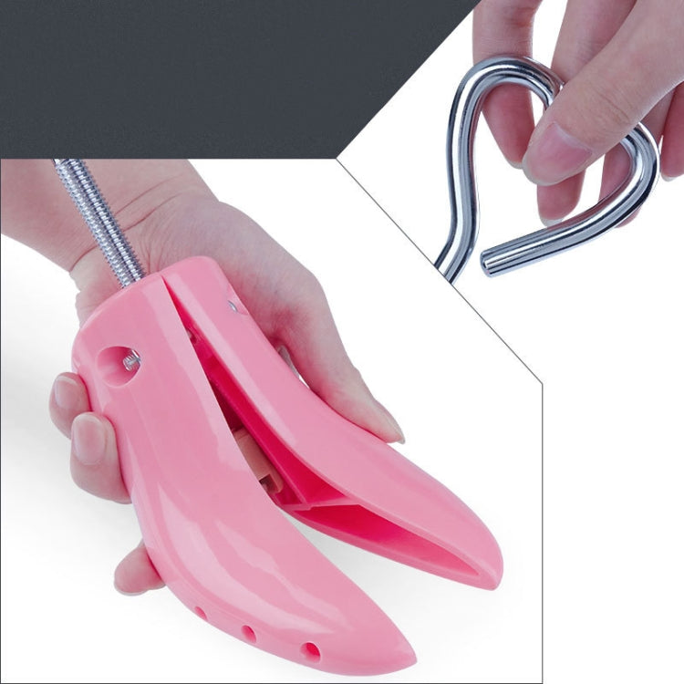 Pink adjustable boot support with prongs and heart-shaped hanging hook
