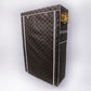 Brown patterned fabric closet cabinet with front door and vertical seams