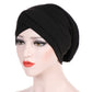 Black stretch headscarf cap with forehead cross wrap and snug fit