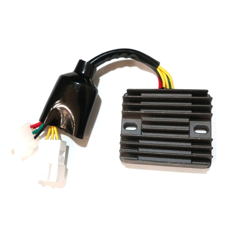 Motorcycle voltage rectifier with finned metal heatsink and multi-wire connector