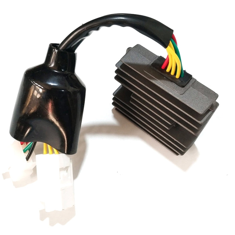 Motorcycle rectifier/regulator with black case, finned heatsink, and colored wiring leads