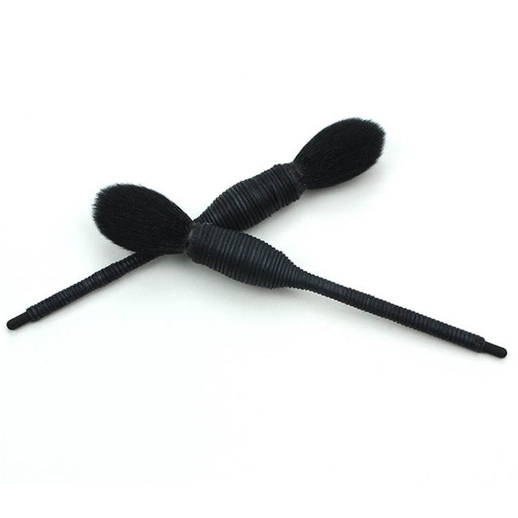 Set of two blush brushes with black ribbed handles and soft oval bristle heads