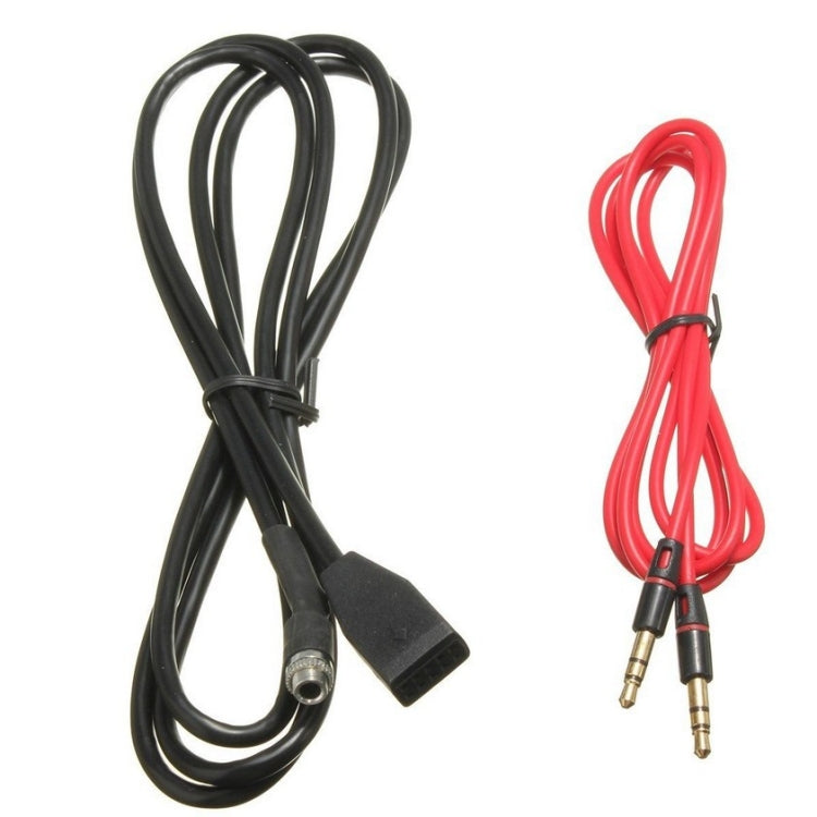 AUX audio cable with black and red cords and two gold 3.5mm plugs