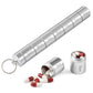 Portable 7-day metal pill organizer tube with flip-open end, key ring and labeled days