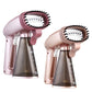 Two rose-pink mini handheld garment steamers with angled steam heads