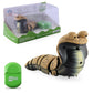 Gray cobra remote-control toy with segmented legs and green infrared remote in box.